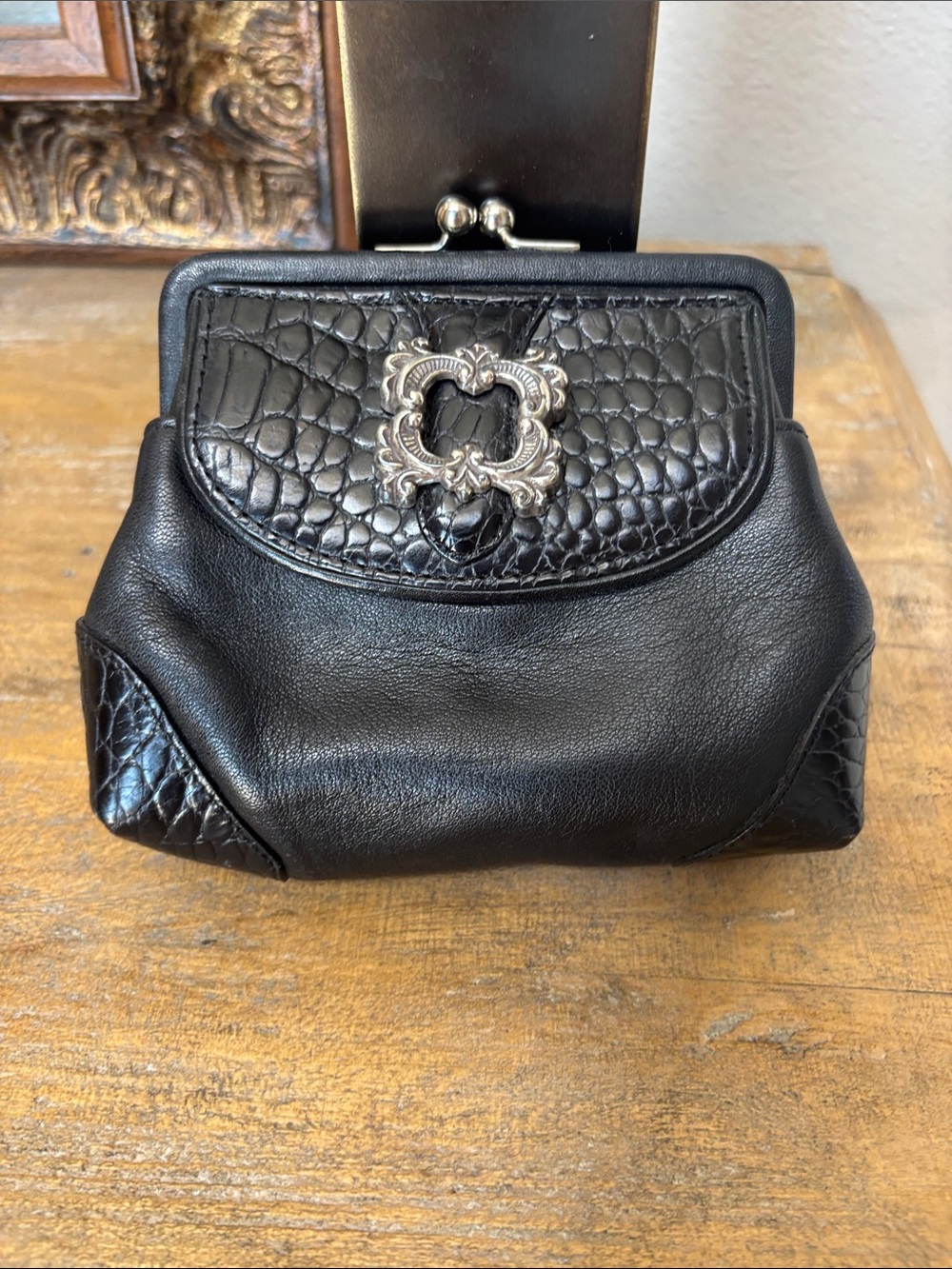 Brighton Black Leather Clutch with Croc-Textured Flap and Silver Ornament